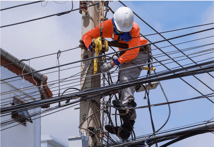 worker fixing electric cables