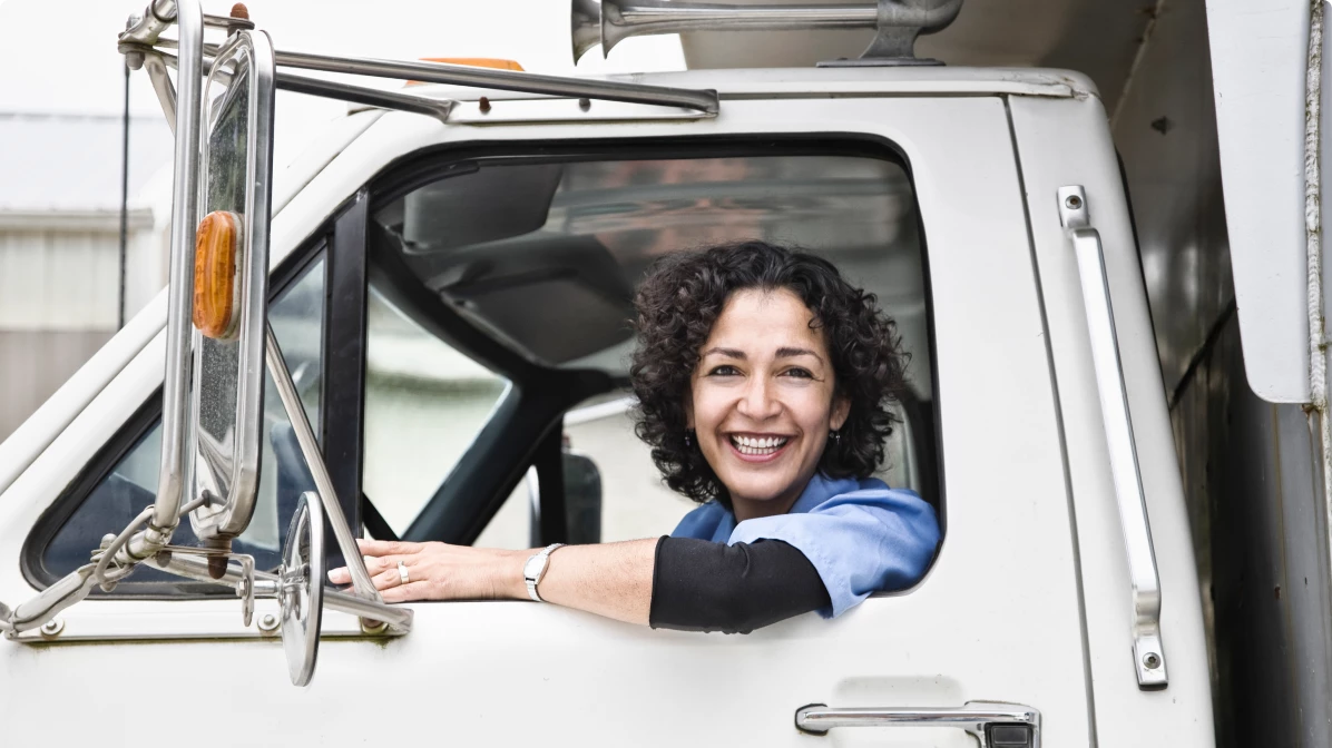 hispanic-woman-truck-driver-and-company-delivery-t-2022-03-04-02-09-49-utc 2